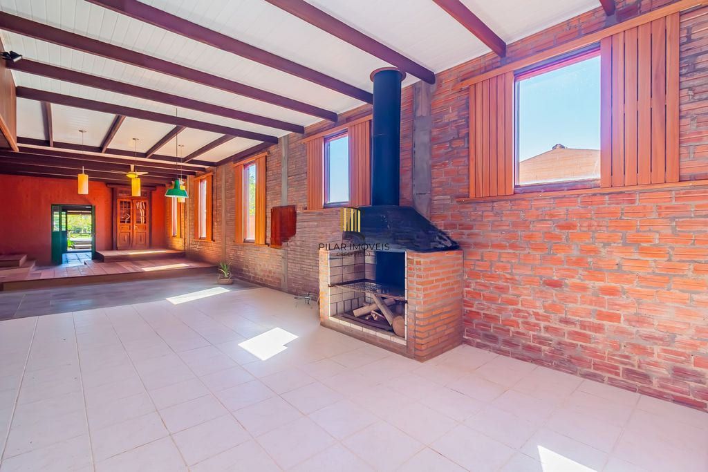 Casa de 3 dormitórios, no Bairro Ponta Grossa - Porto Alegre