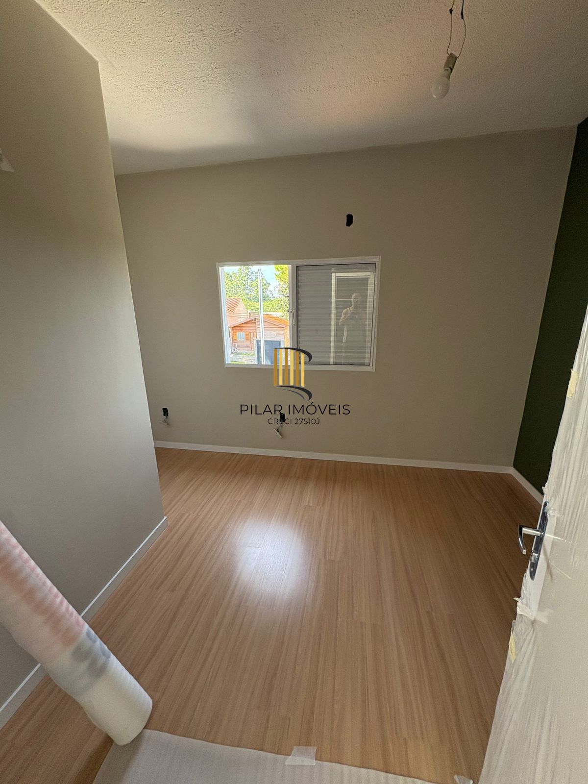 Casa de 2 dormitórios no bairro Lomba Do Pinheiro - Porto Alegre