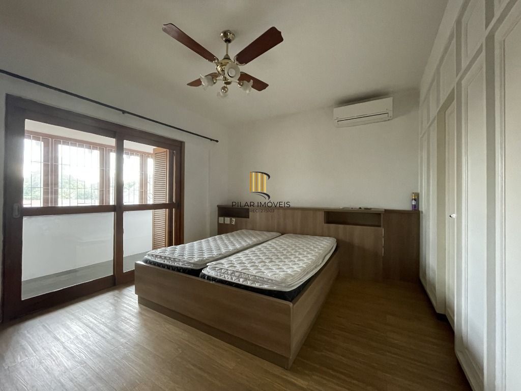 Casa 6 dormitórios no bairro Partenon