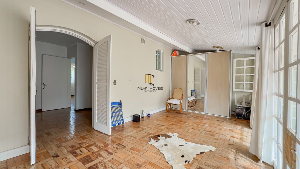 Sobrado de 3 dormitórios e 91m² à venda em Parque Santa Fé, Porto Alegre.