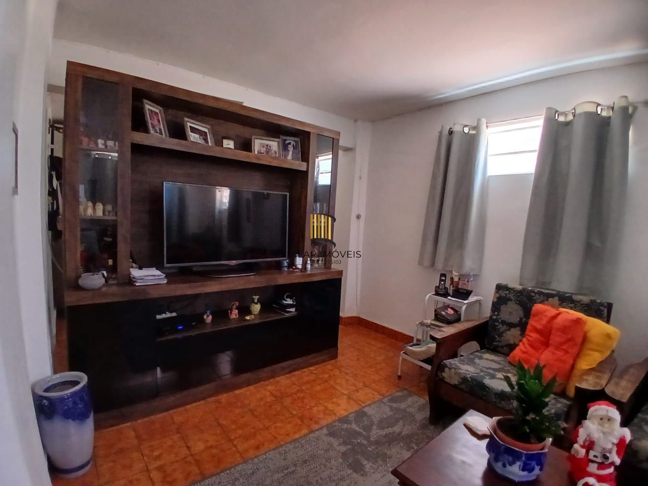 Casa com 03 dormitorios e amplo jardim no bairro Santa Tereza /RS