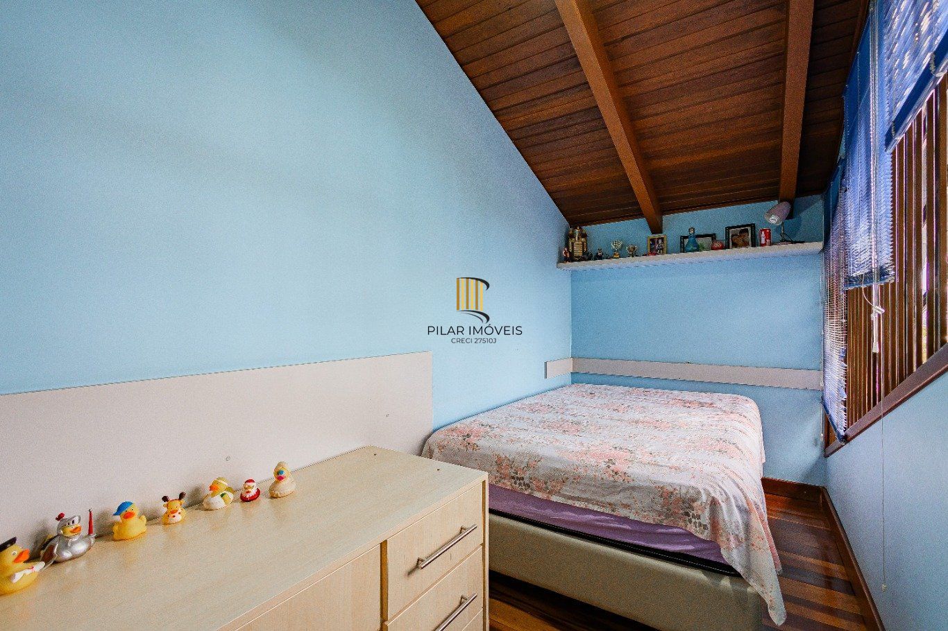Casa de 4 dormitórios e 208m² à venda no Bairro Jardim Botânico, Porto Alegre.