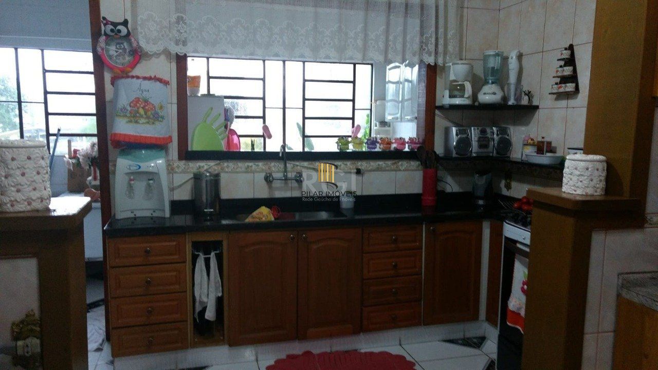 Casa 3 dormitórios no bairro Parque Olinda