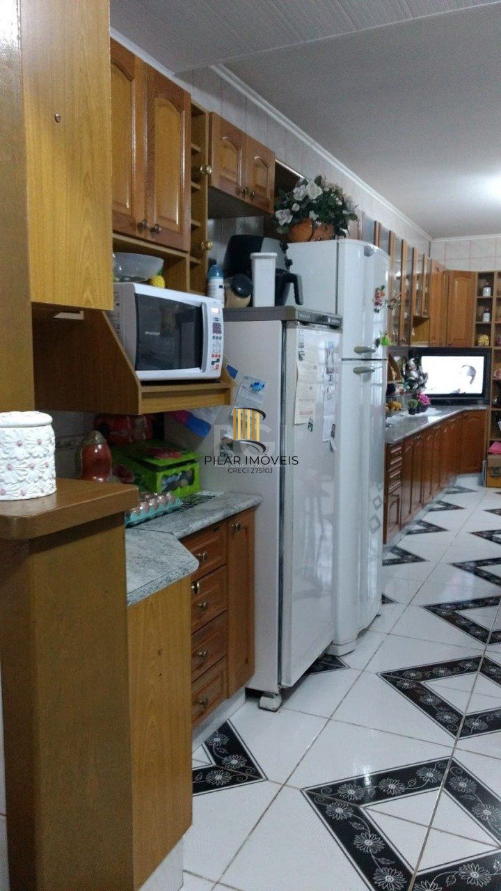 Casa 3 dormitórios no bairro Parque Olinda
