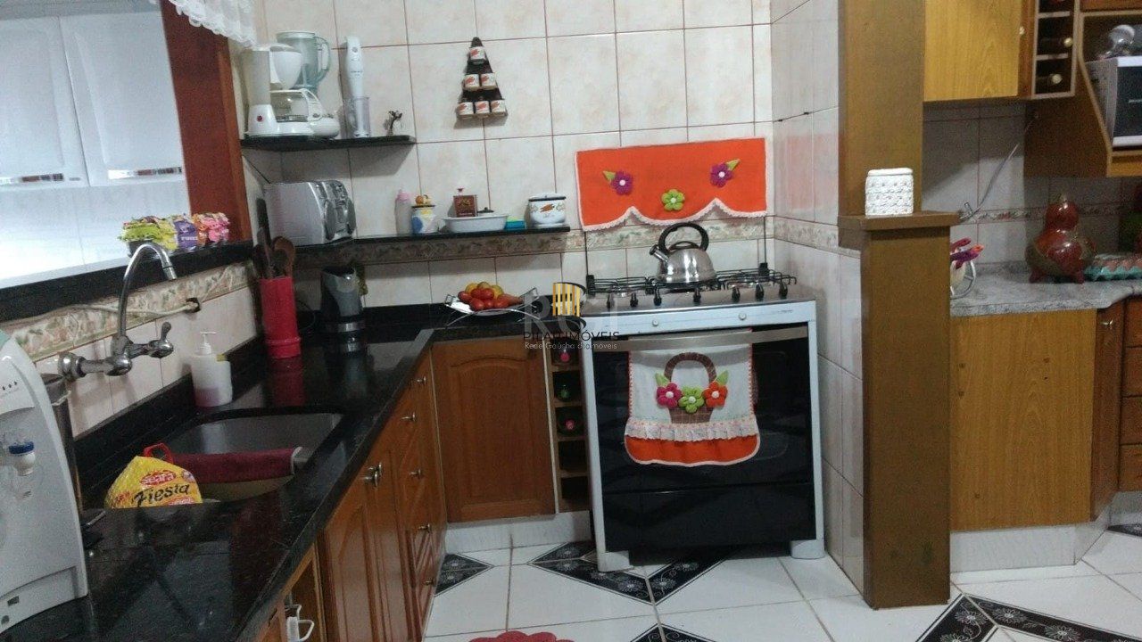 Casa 3 dormitórios no bairro Parque Olinda