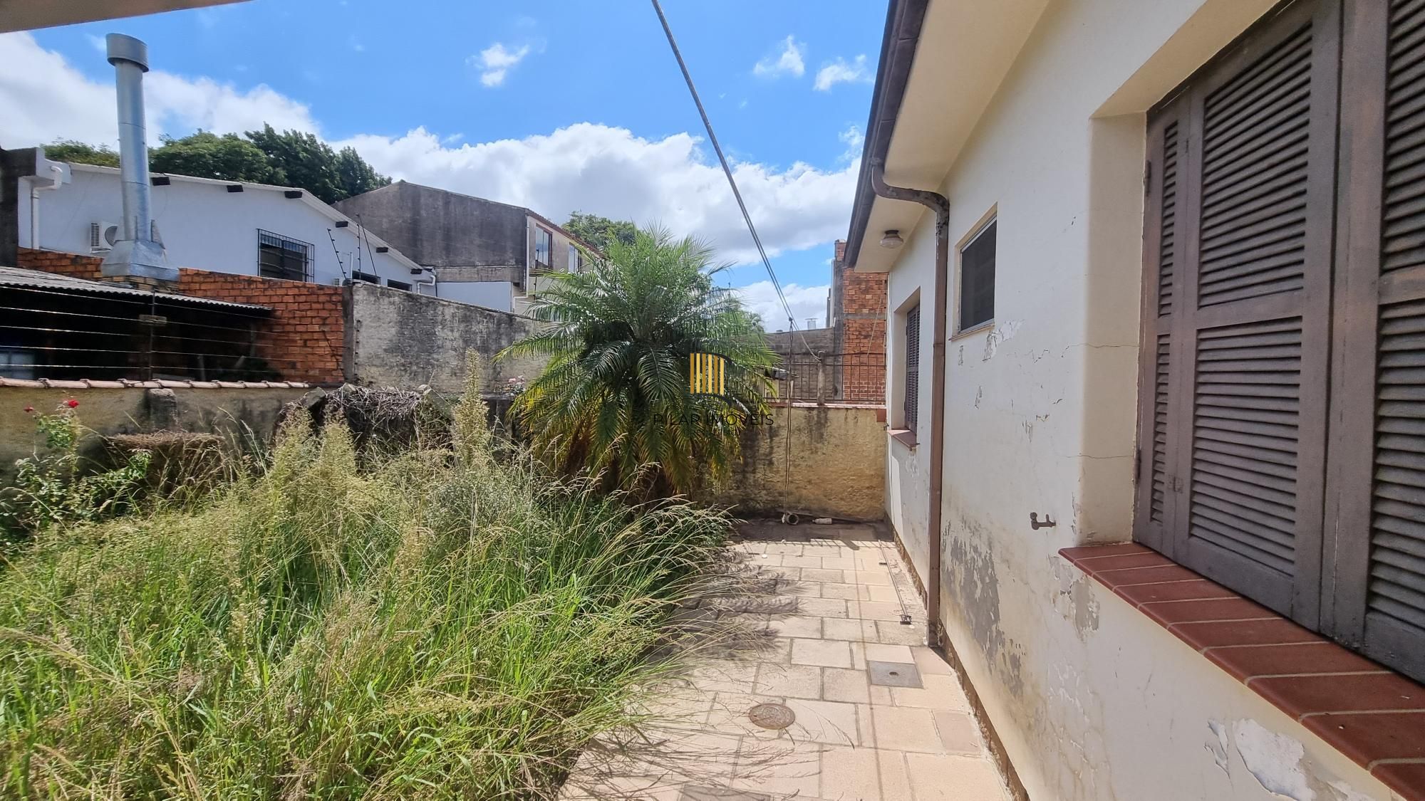 Casa com loja na frente a venda no Bairro Anchieta