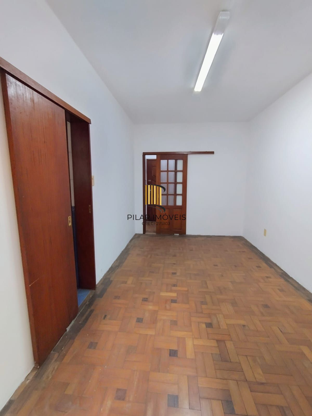 Apartamento térreo 2 quartos com amplo pátio em L no bairro Santana
