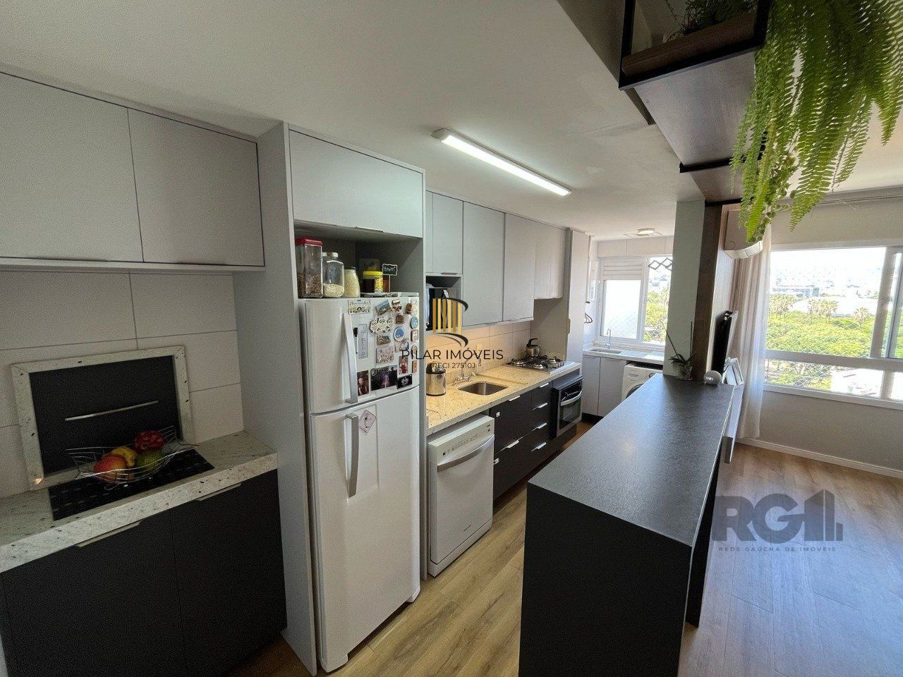 Apartamento 2 quartos, suíte e garagem na Cidade Baixa.