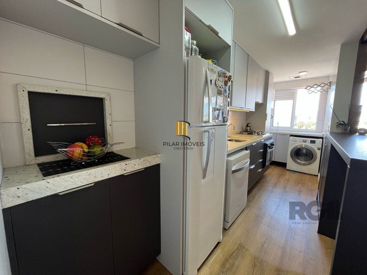 Apartamento 2 quartos, suíte e garagem na Cidade Baixa.