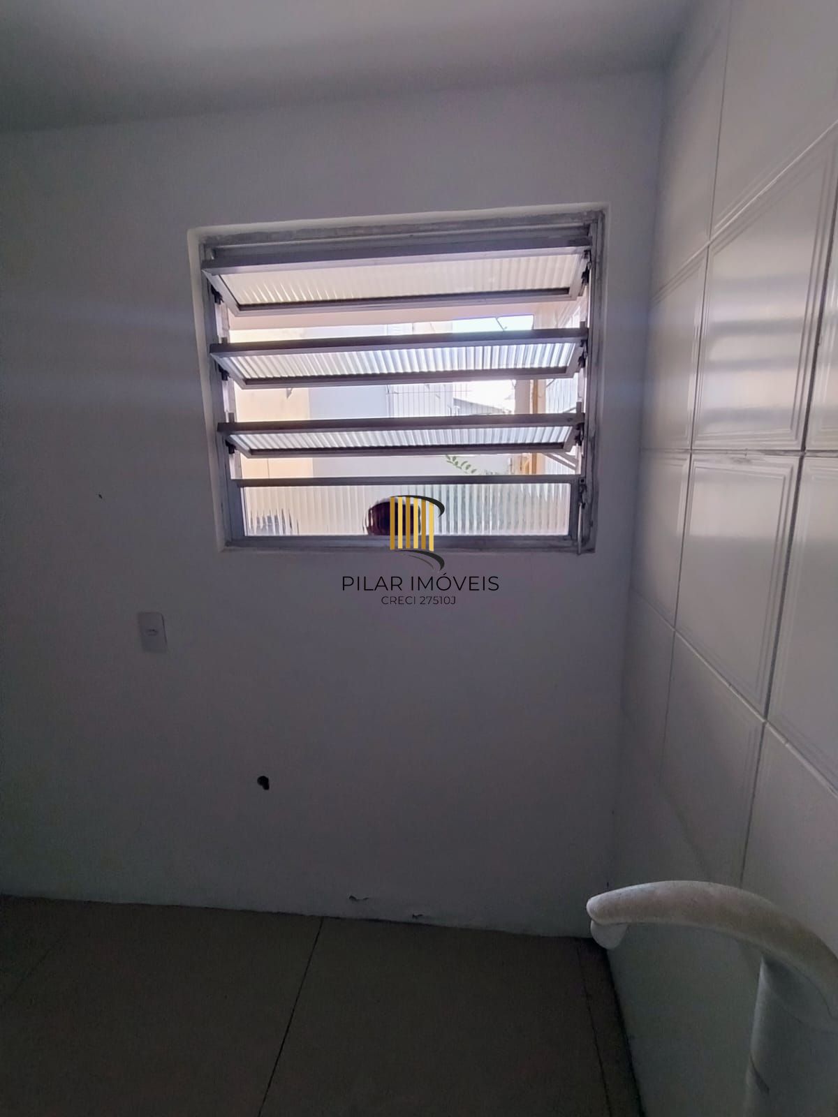Apartamento térreo 2 quartos com amplo pátio em L no bairro Santana