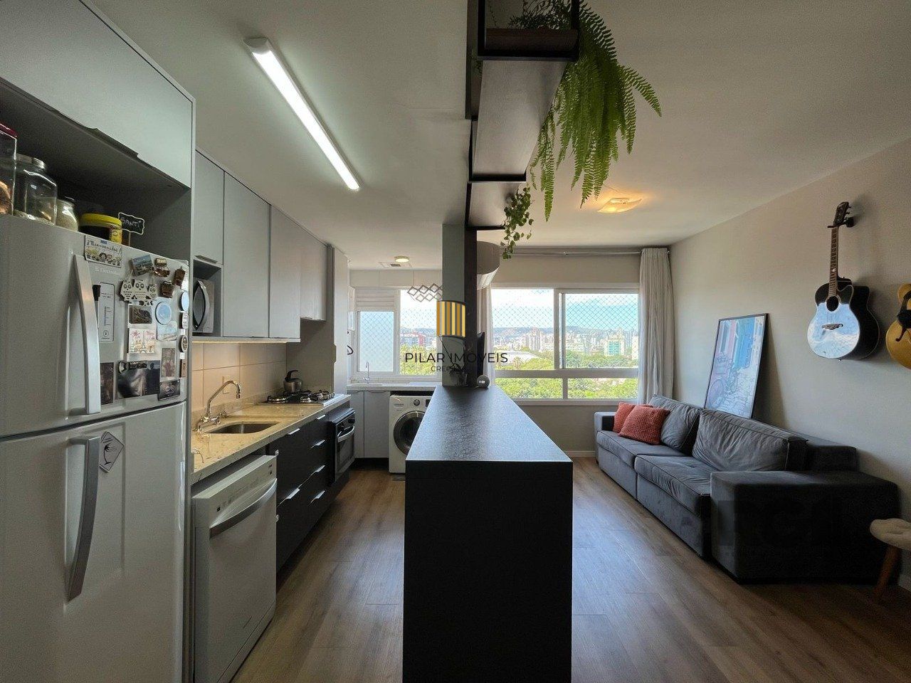 Apartamento 2 quartos, suíte e garagem na Cidade Baixa.