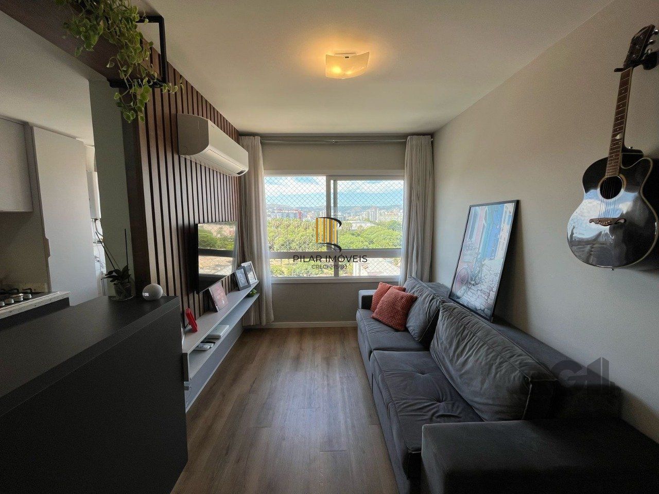 Apartamento 2 quartos, suíte e garagem na Cidade Baixa.