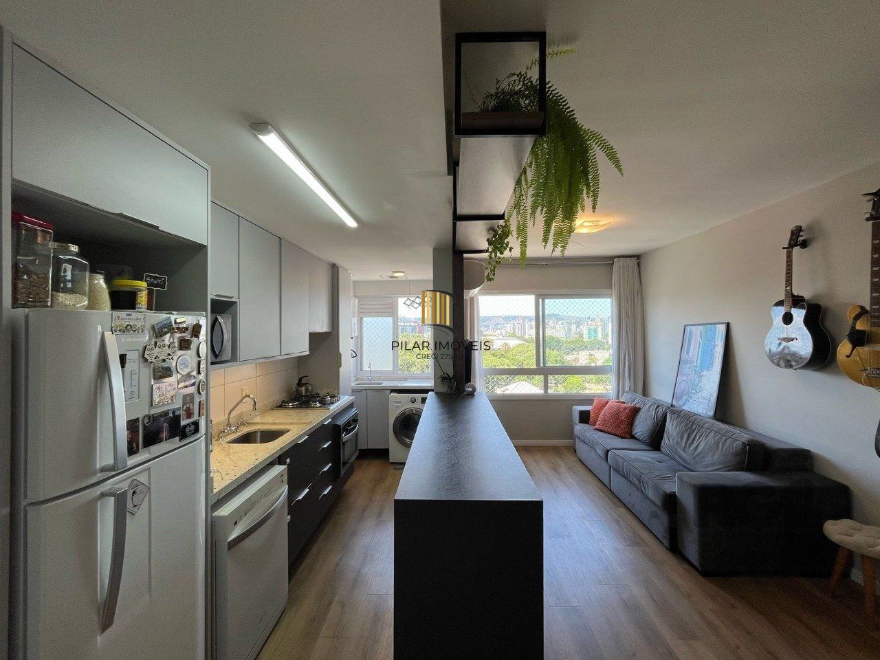 Apartamento 2 quartos, suíte e garagem na Cidade Baixa.