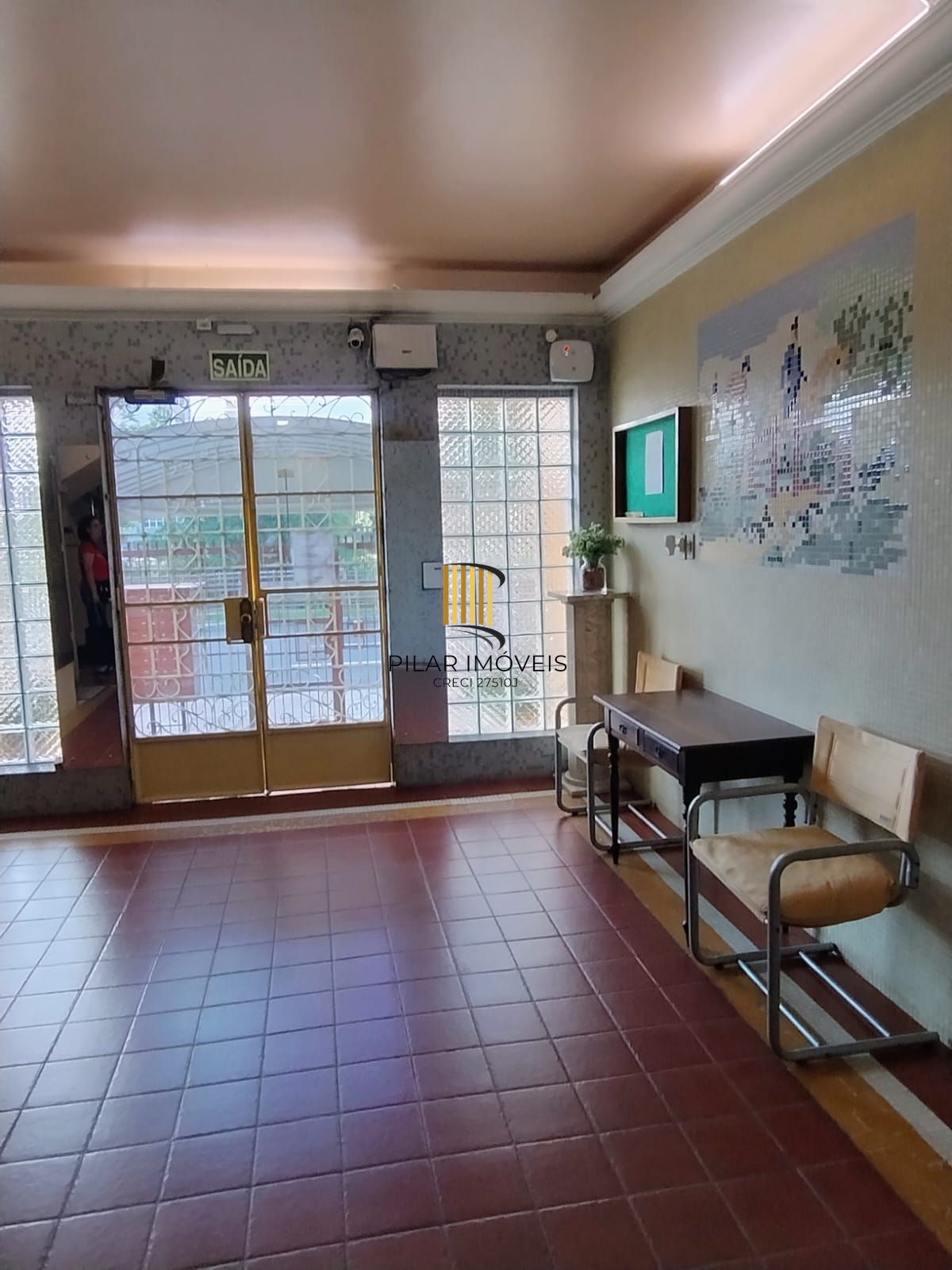 Apartamento térreo 2 quartos com amplo pátio em L no bairro Santana