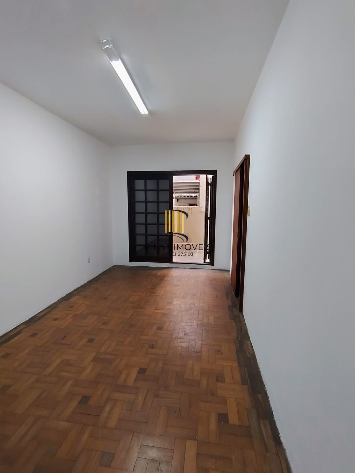Apartamento térreo 2 quartos com amplo pátio em L no bairro Santana