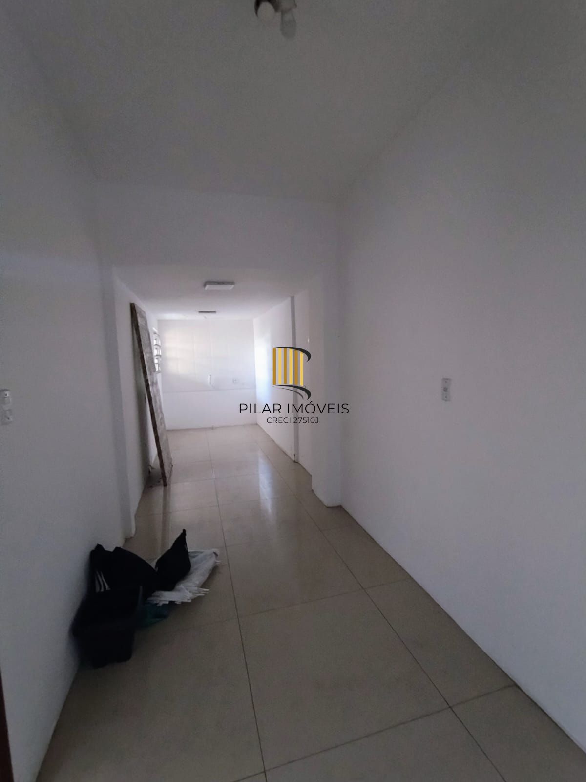 Apartamento térreo 2 quartos com amplo pátio em L no bairro Santana