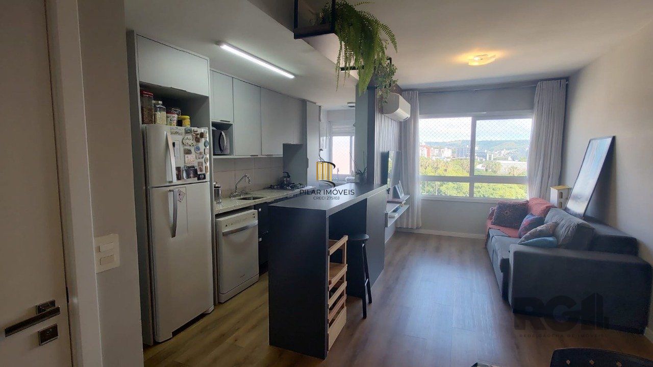 Apartamento 2 quartos, suíte e garagem na Cidade Baixa.