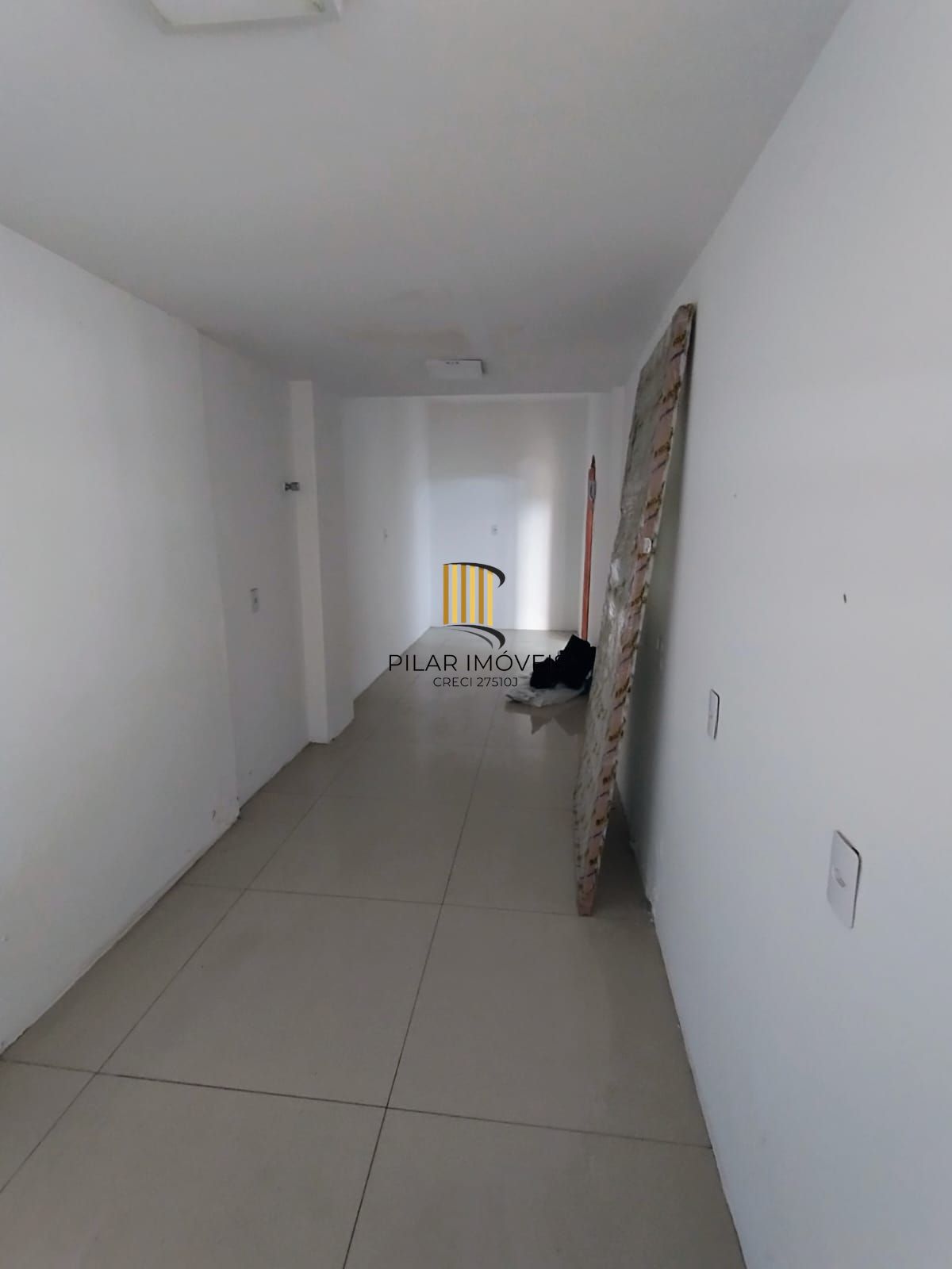 Apartamento térreo 2 quartos com amplo pátio em L no bairro Santana