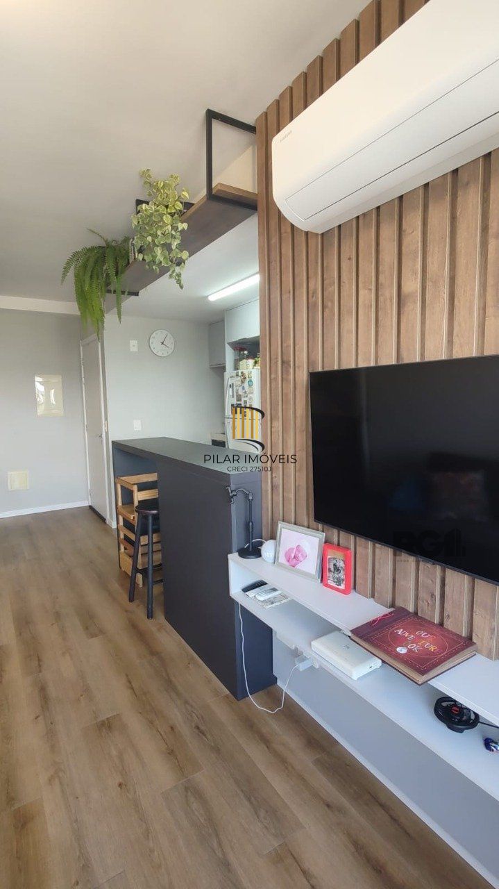 Apartamento 2 quartos, suíte e garagem na Cidade Baixa.