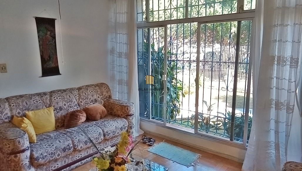 Casa 5 dormitórios no bairro Glória