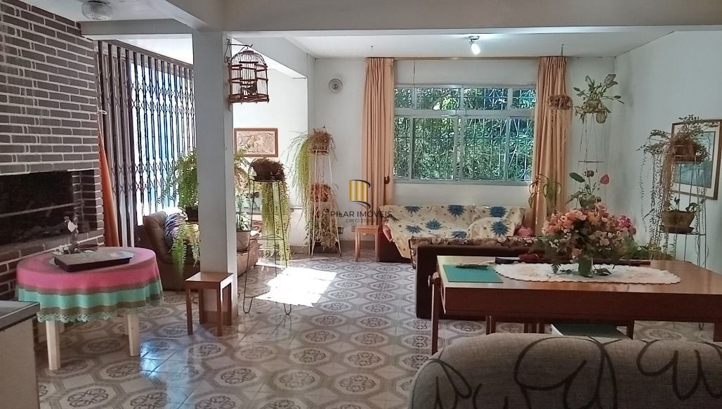 Casa 5 dormitórios no bairro Glória