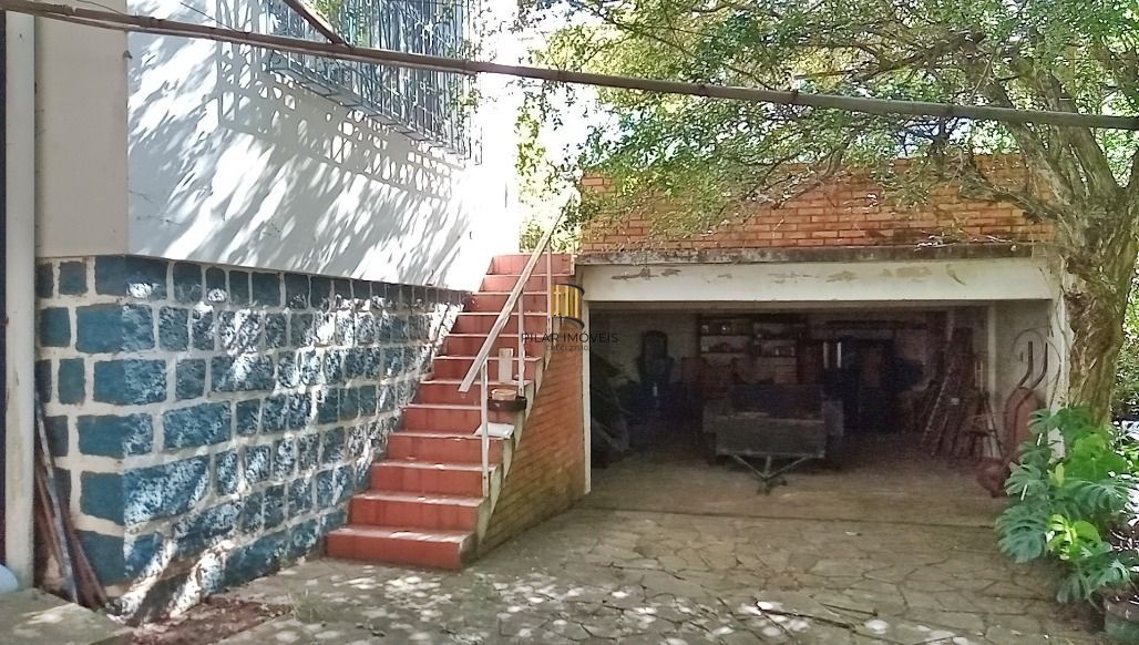 Casa 5 dormitórios no bairro Glória