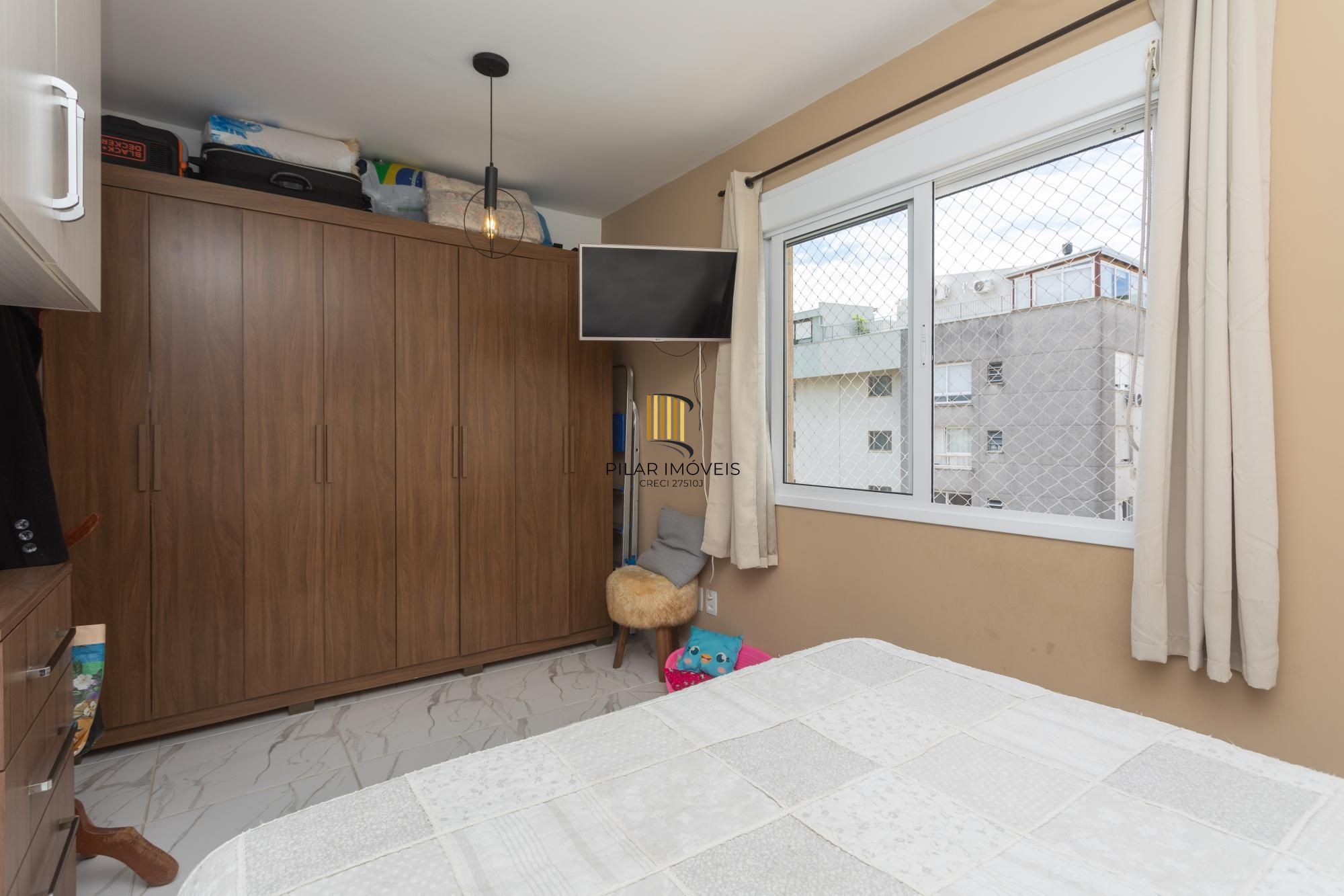 Apartamento de 3 dormitórios com suíte e garagem dupla no bairro Santana