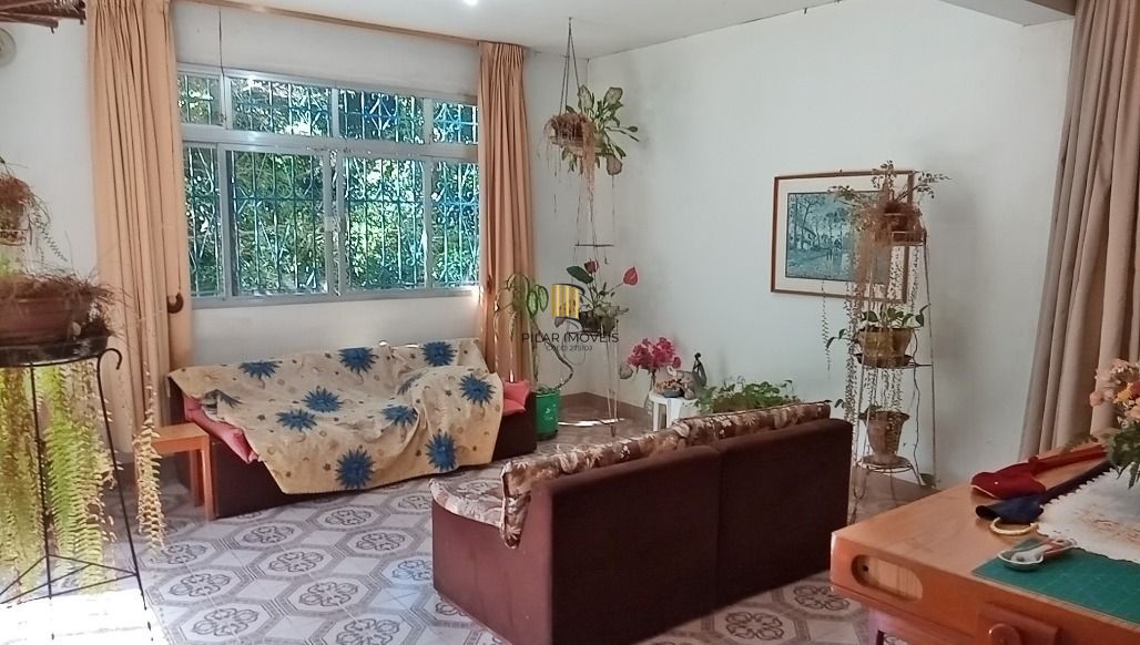 Casa 5 dormitórios no bairro Glória