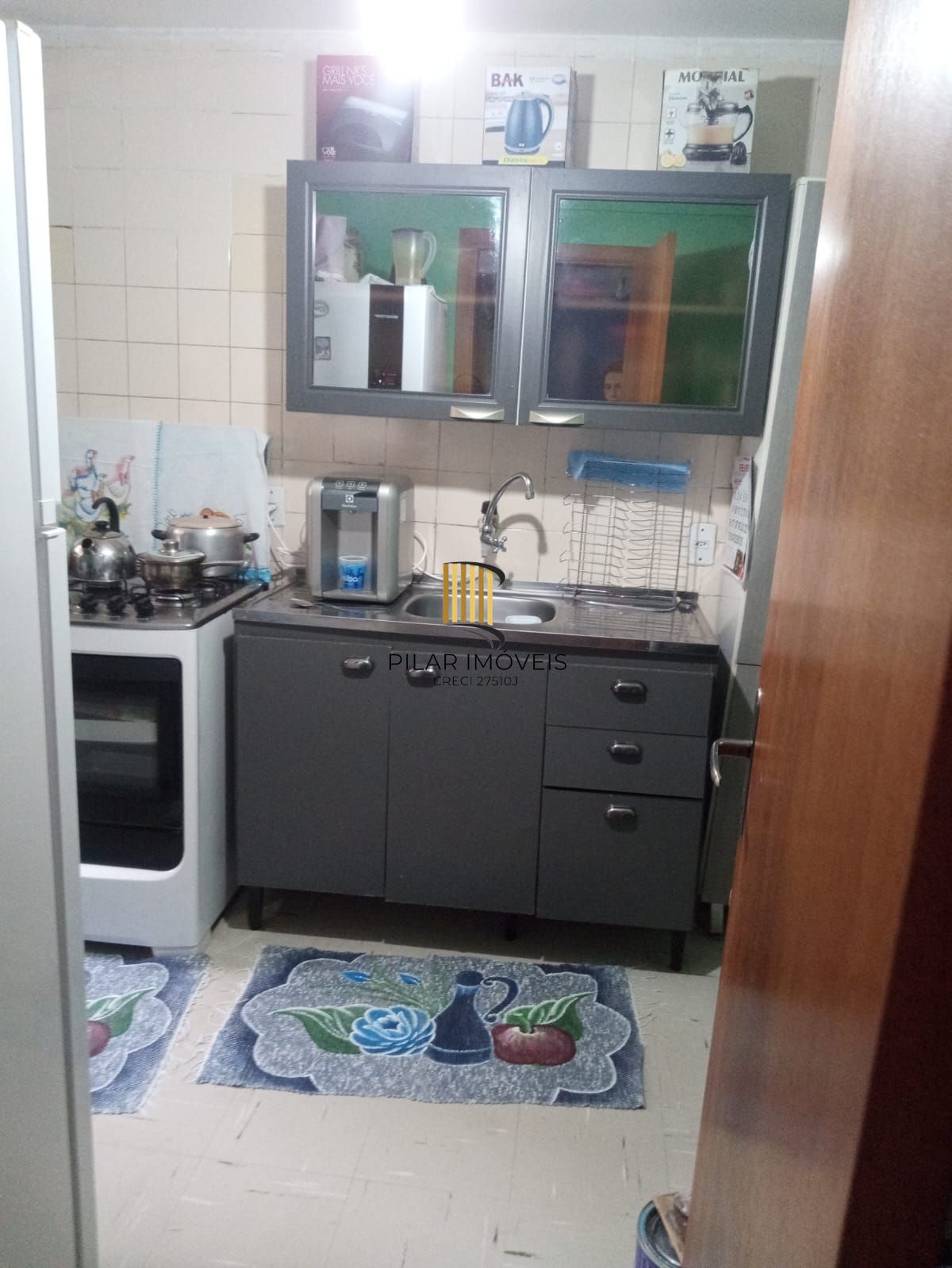 Apartamento dois dormitórios térreo com uma vaga escriturada