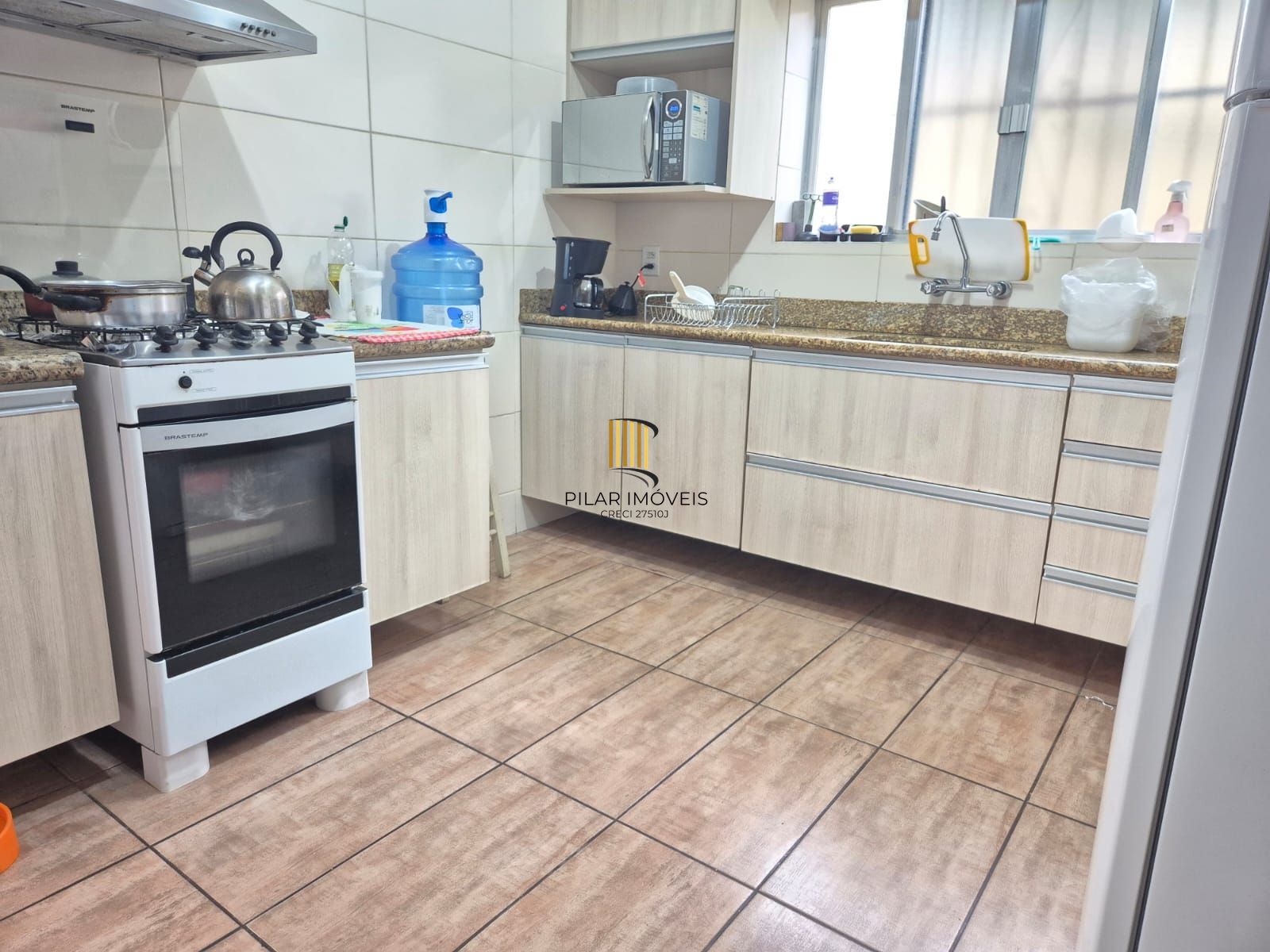 Terreno com 2 casas, totalizando 434,72m2. Excelente lotalização no coração do Menino Deus