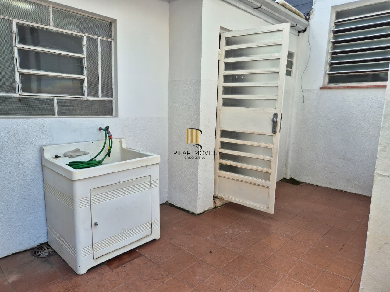 Casa comercial no miolo do bairro Menino Deus