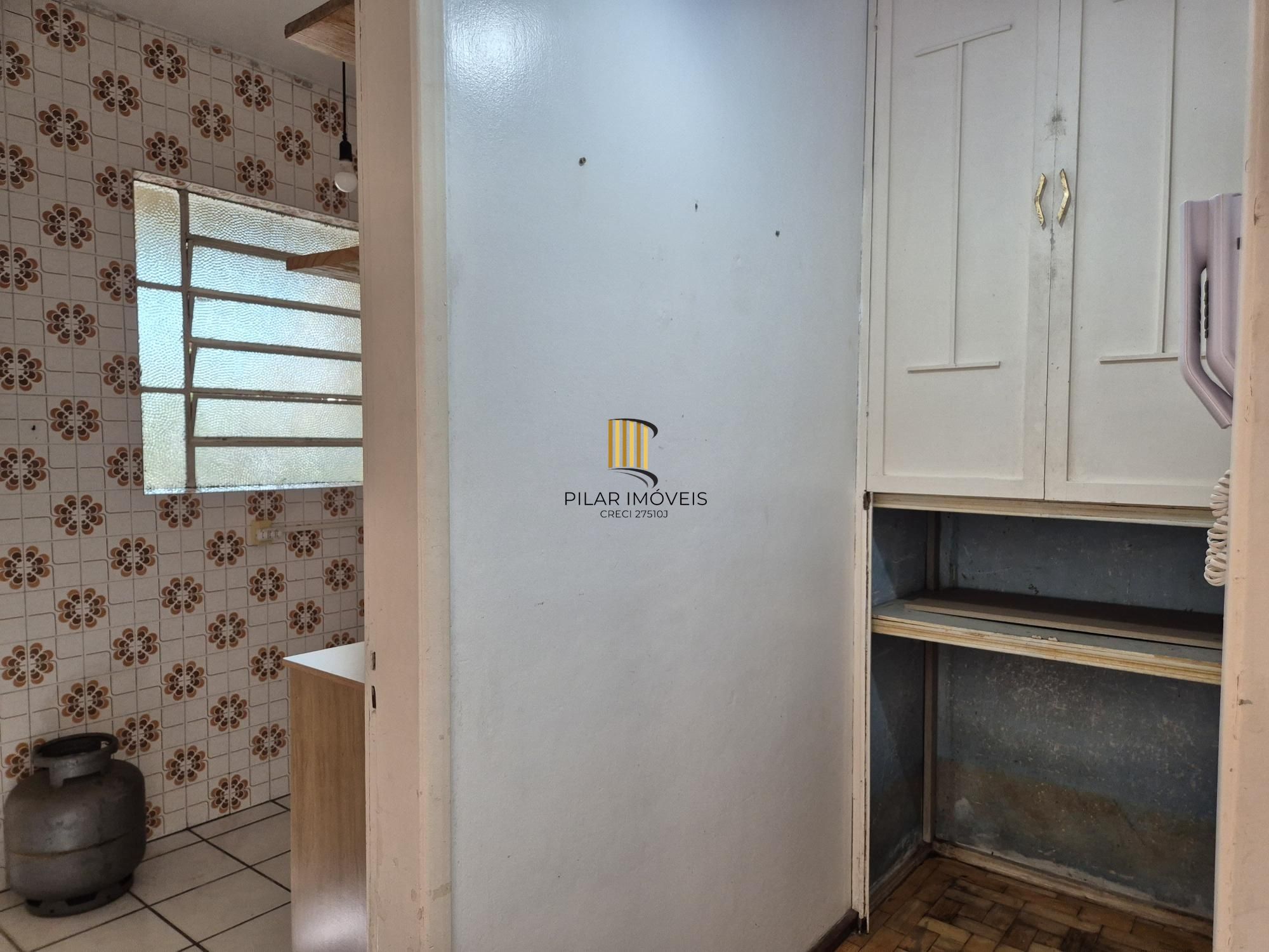 Um dormitório em 50m²