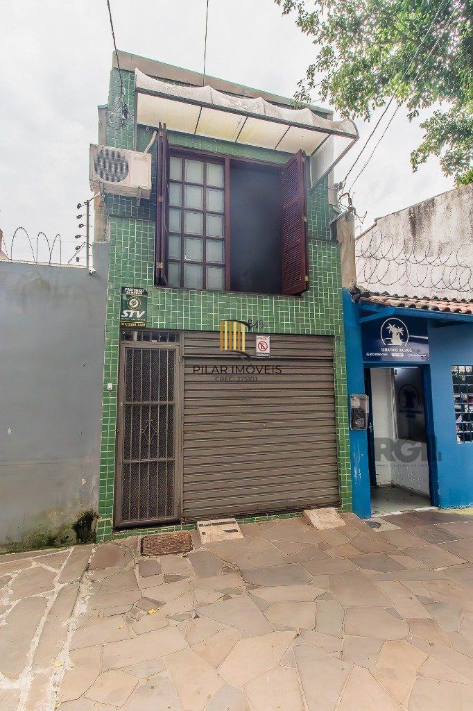 Casa para Venda - 110m², 2 dormitórios, sendo 1 suites, 2 vagas - Menino Deus