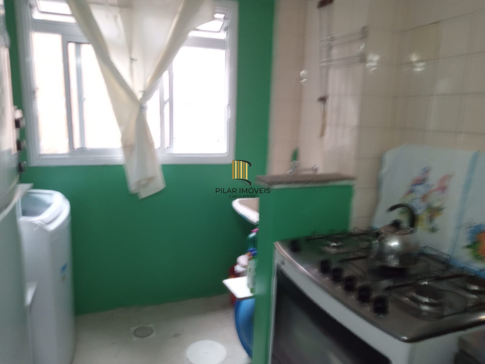 Apartamento dois dormitórios térreo com uma vaga escriturada