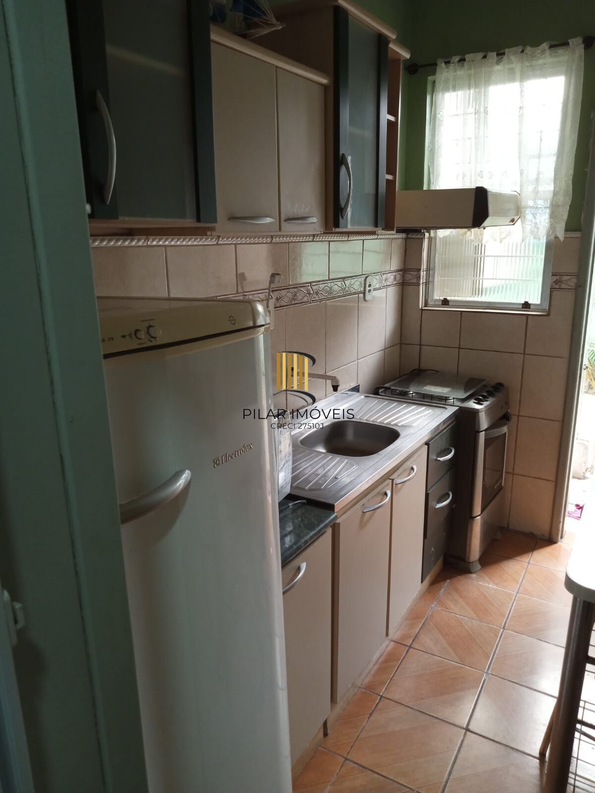 Apartamento um dormitório térreo com terraço lateral