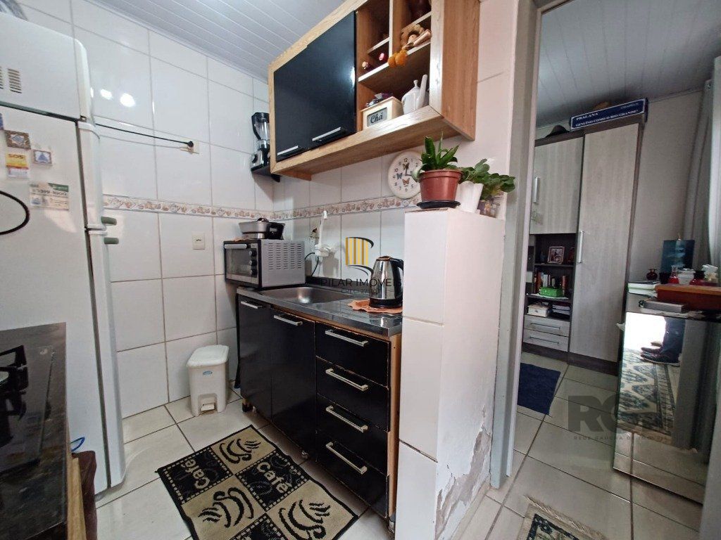 Casa térrea com edícula aos fundos