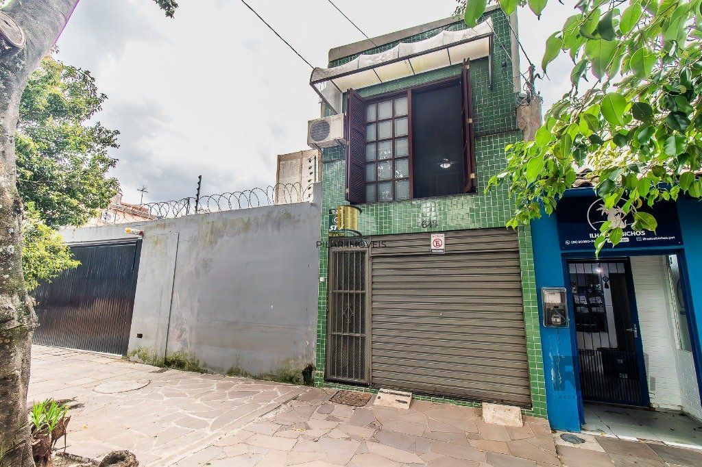 Casa para Venda - 110m², 2 dormitórios, sendo 1 suites, 2 vagas - Menino Deus