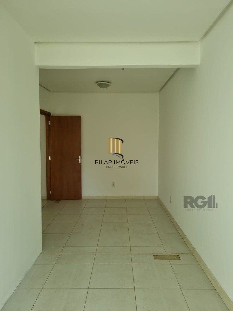 Sala com 2 ambientes e vaga