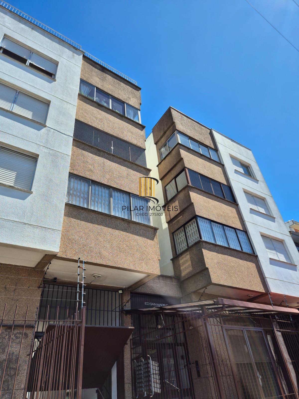 Um dormitório com sacada - Pilar Imóveis