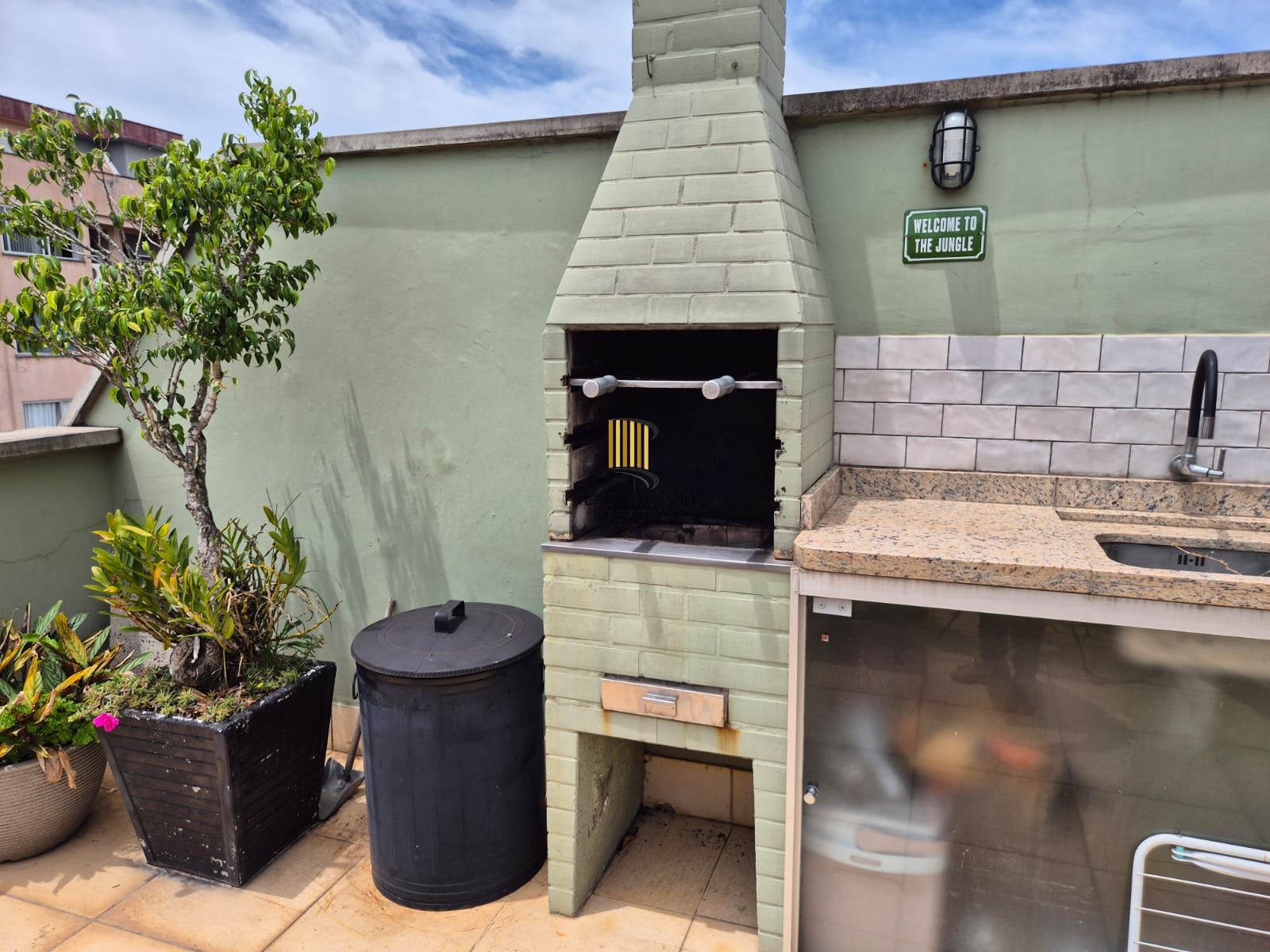 Cobertura reformada com churrasqueira