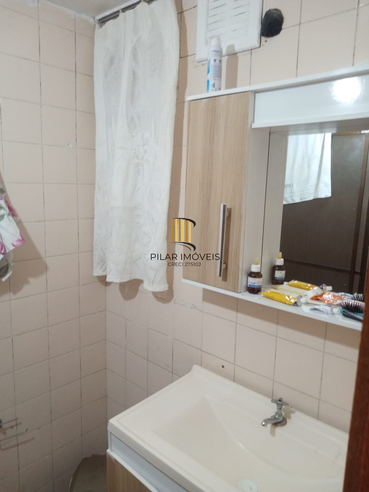 Apartamento dois dormitórios térreo com uma vaga escriturada