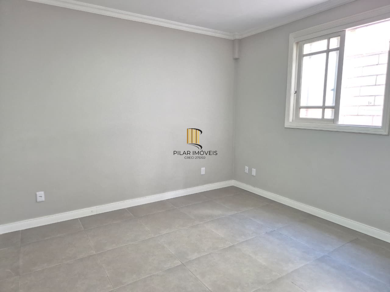 Casa comercial no miolo do bairro Menino Deus