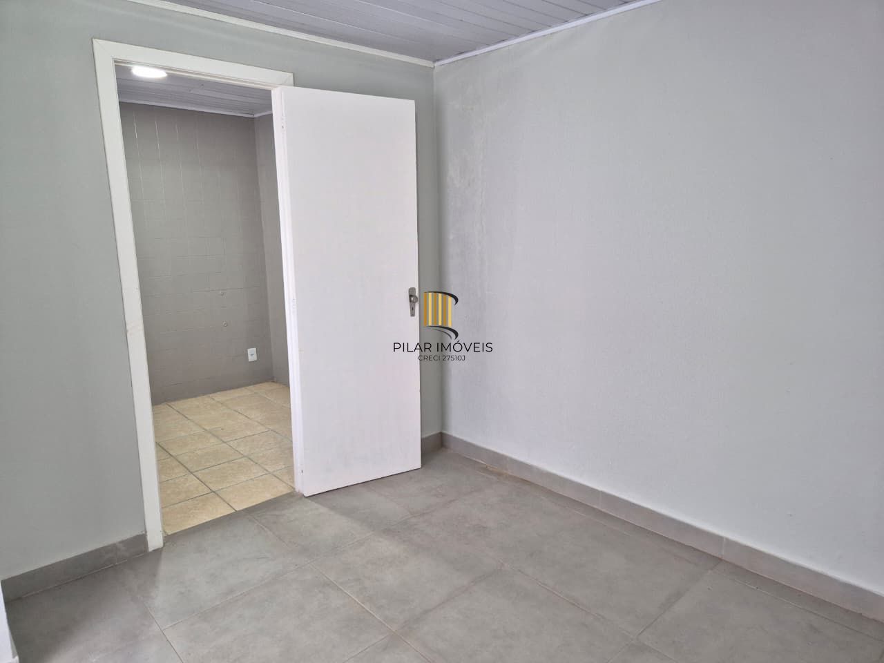 Casa comercial no miolo do bairro Menino Deus