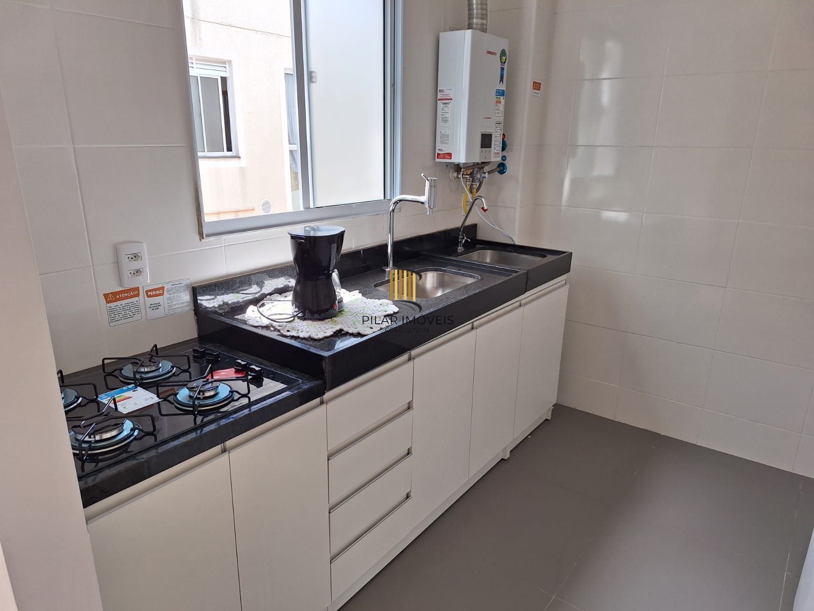 Apartamento 02 dormitorios com estacionamento privativo