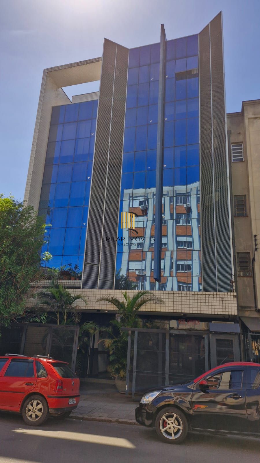 Sala na Rua General Lima e Silva com 68,50 m² de área privativa, pátio com churrasqueira - Pilar Imóveis