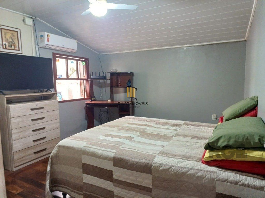 Casa térrea com salão de festas