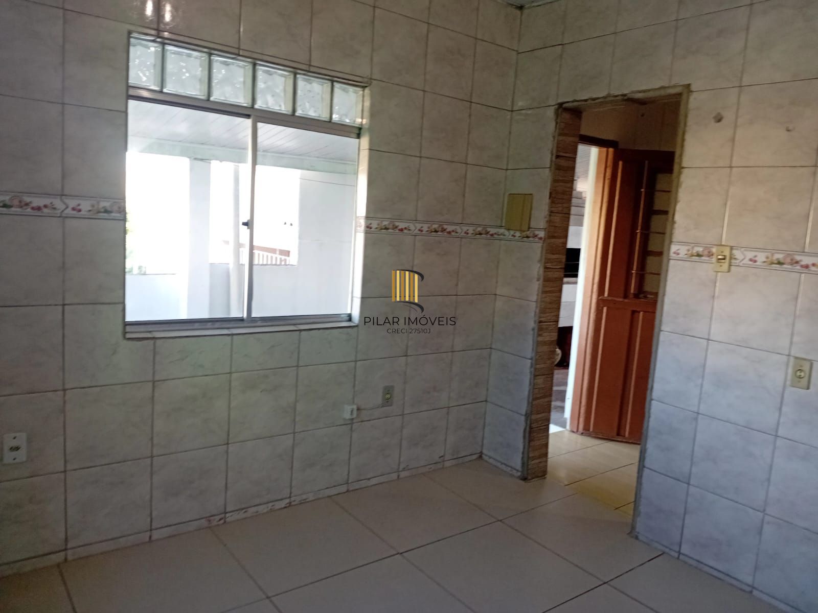 Casa 3 dormitórios no bairro Partenon