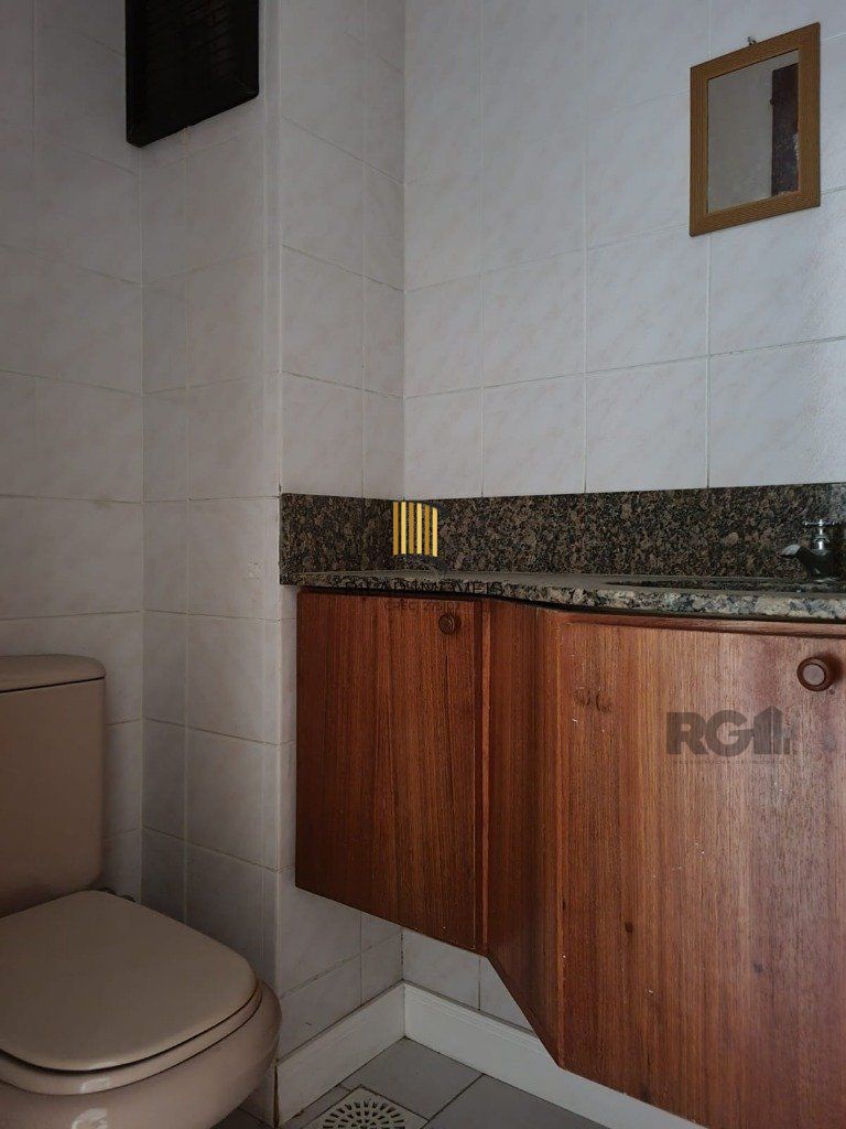 Sala com 2 ambientes e vaga
