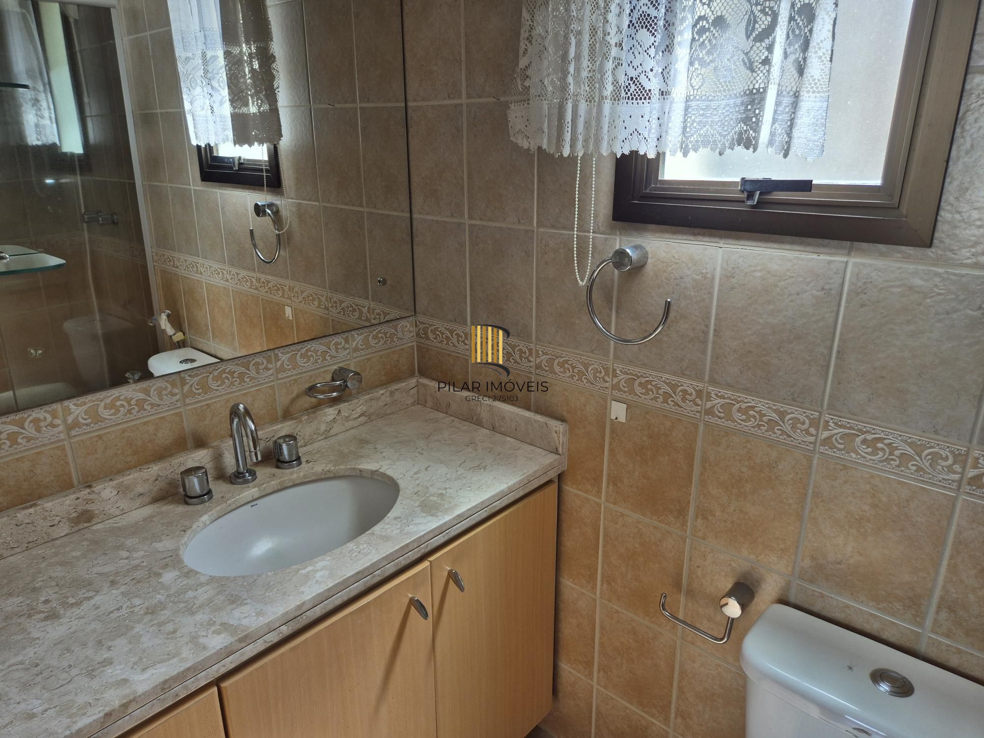 2D com suíte, churrasqueira e vaga