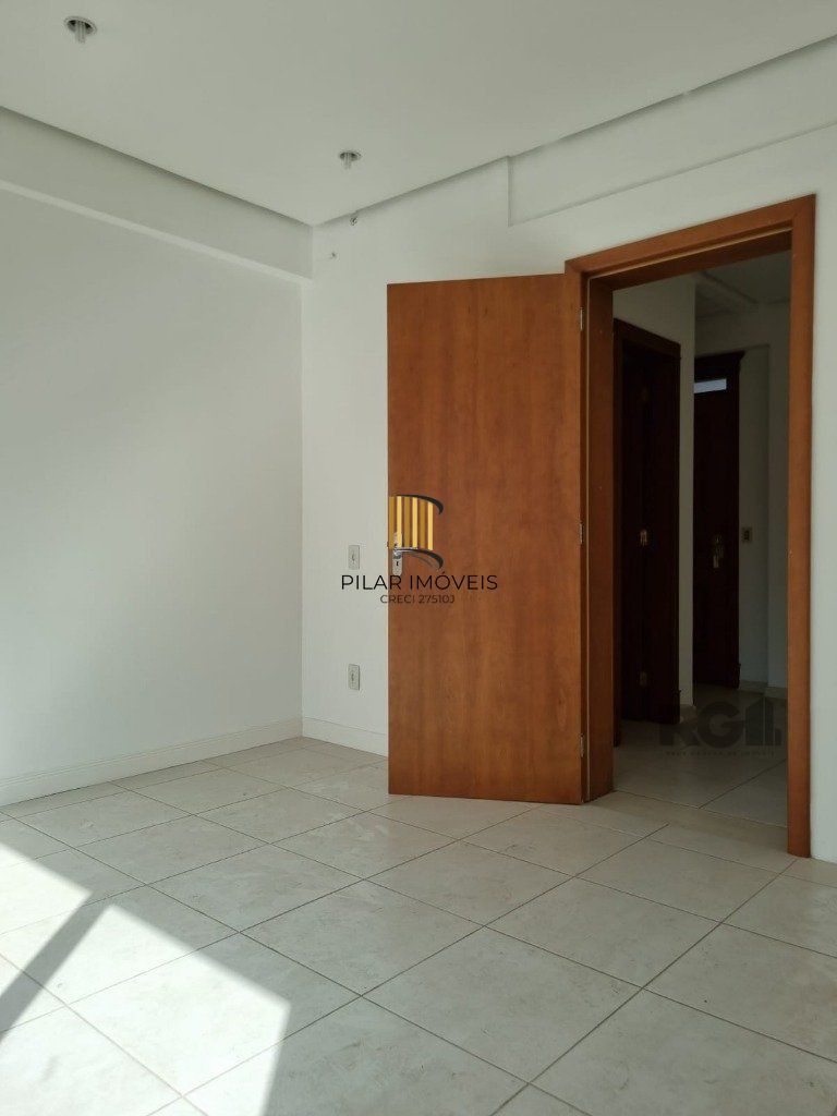 Sala com 2 ambientes e vaga